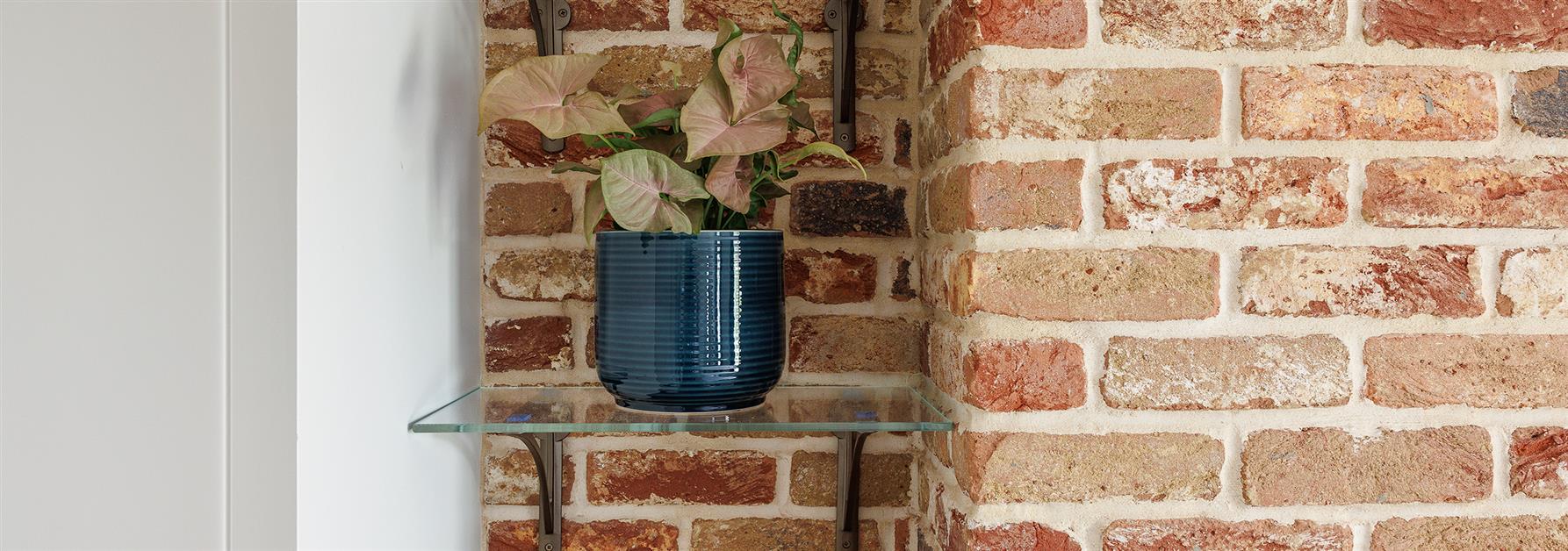 Brick Wall Glass Shelf Bedroom