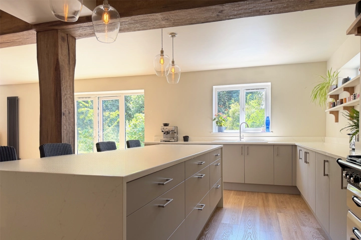 Contemporary kitchen with oak beams
