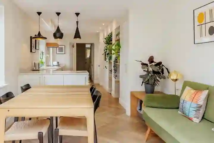 Dining area looking back through mid centry deisgn kitchen