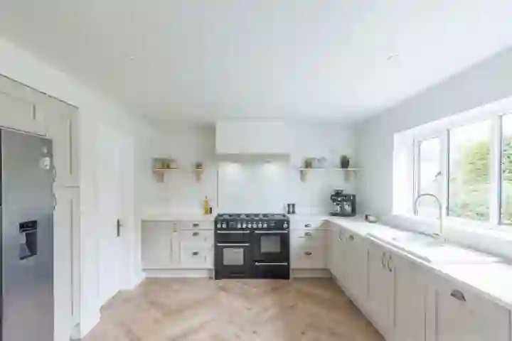 Contemporary kitchen with black Rangemaster cooker 