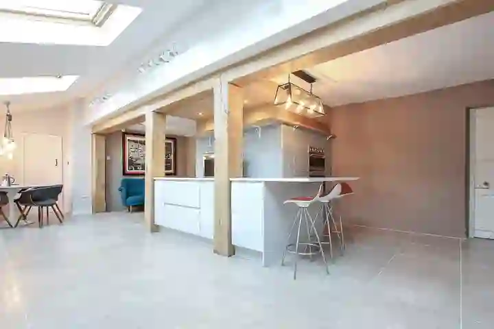 Contemporary kitchen with oak beams