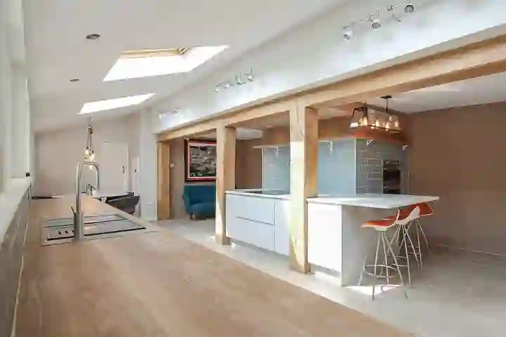 Contemporary kitchen with oak beams