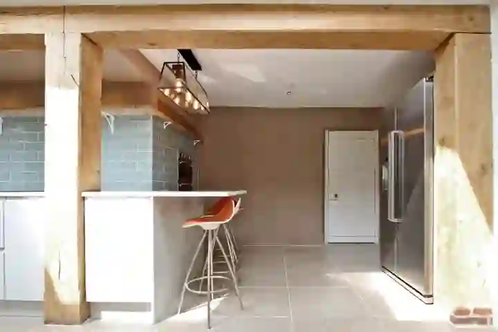 Contemporary kitchen with oak beams
