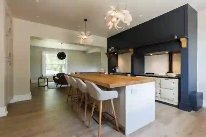 Contemporary kitchen with oak beams