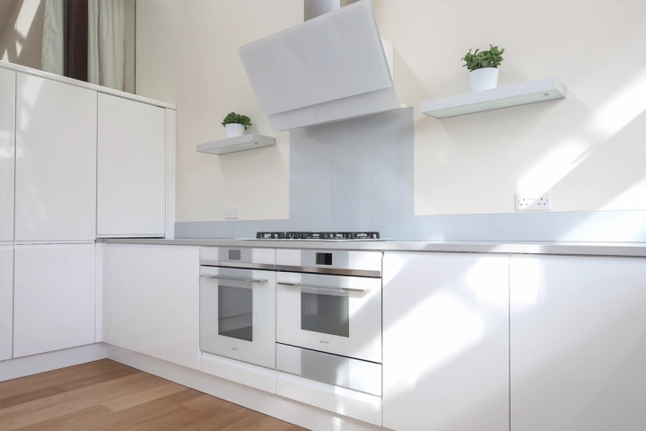 Contemporary kitchen with white appliances
