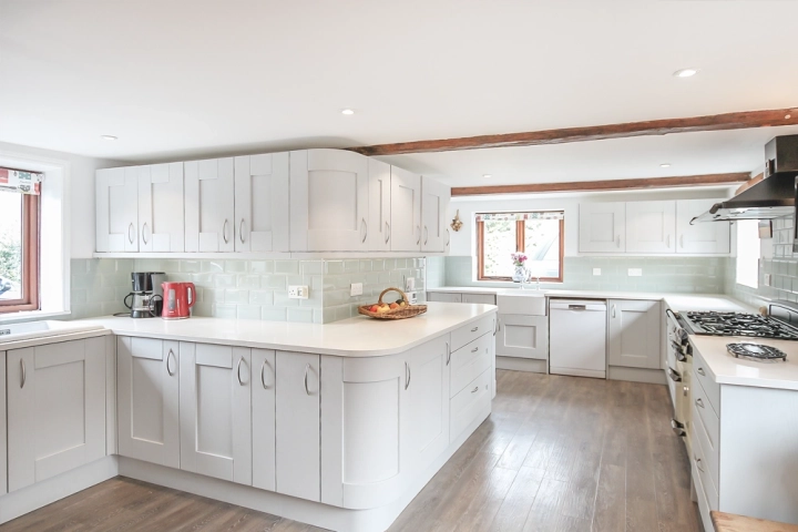 Small design country kitchen with white countertops