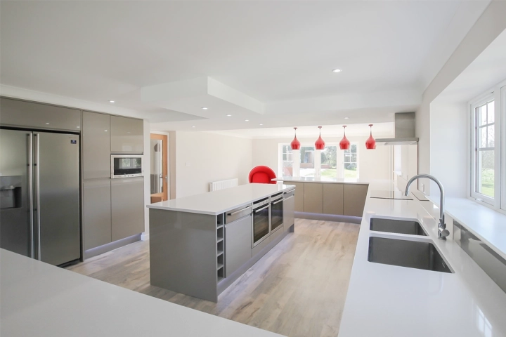 Open plan modern kitchen with chrome