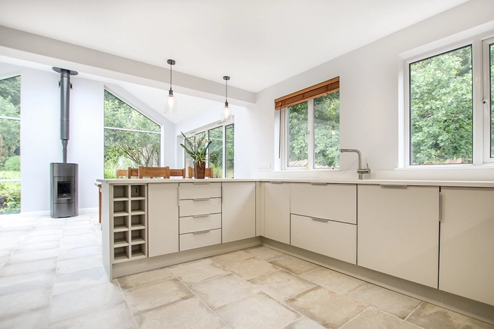 Modern kitchen with in built appliances kitchen storage white worktops