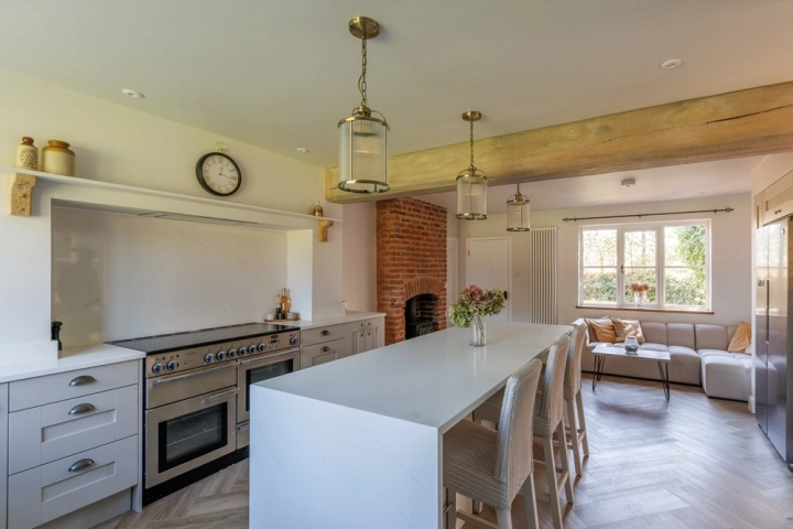 Farmhouse kitchen with waterfall end island